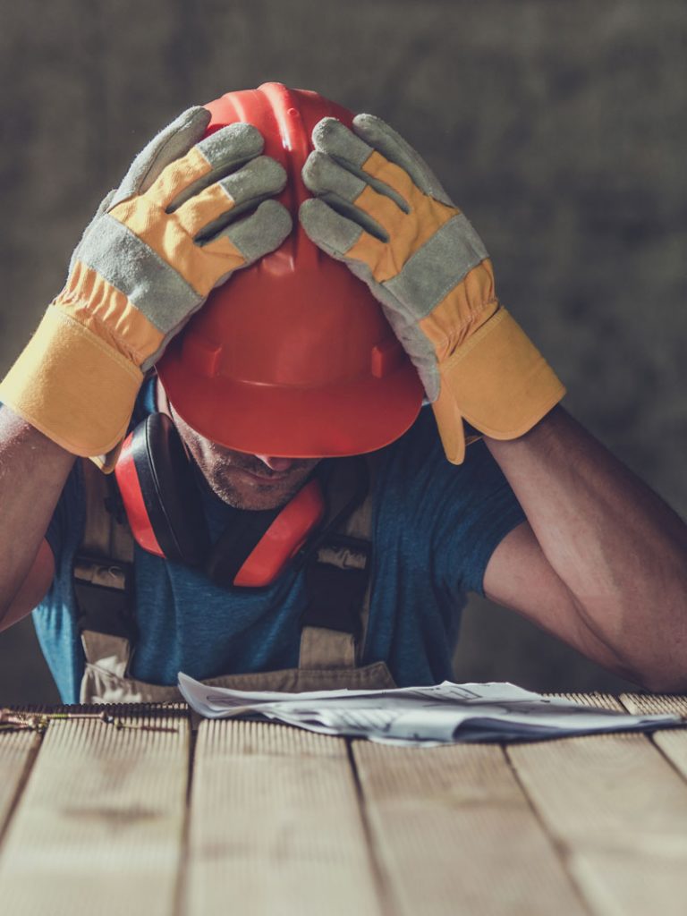 construction worker studying for nascla exam